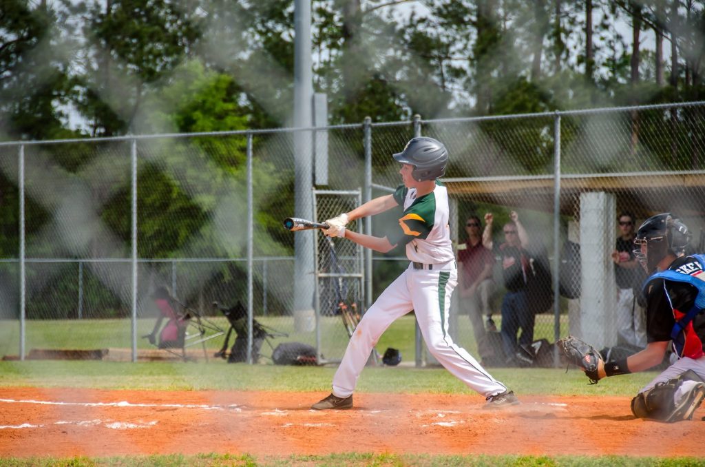 Gramercy Warriors baseball player swinging at the plate